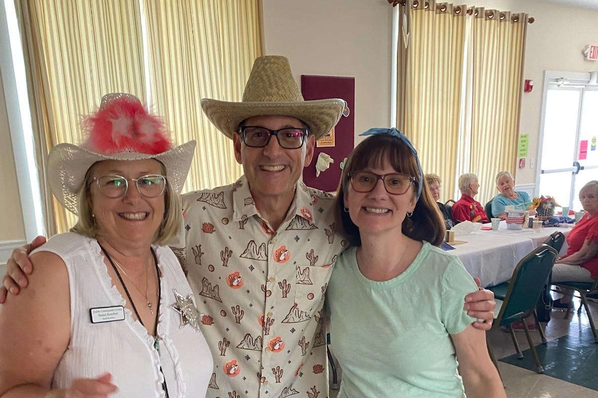 Three People Smiling