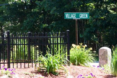 Village Green street sign